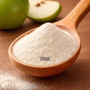 Apple stem cell powder in a wooden spoon