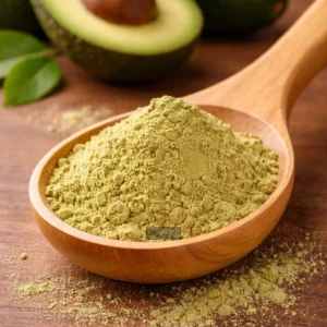 Avocado Extract powder in a wood spoon