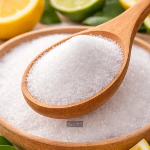 Citric Acid Anhydrous on wooden spoon