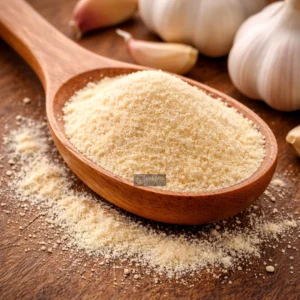 Garlic powder and cloves on wood