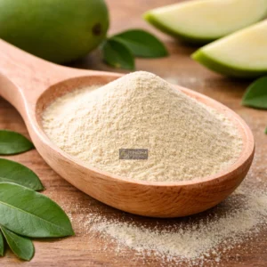 Green mango extract on wooden spoon