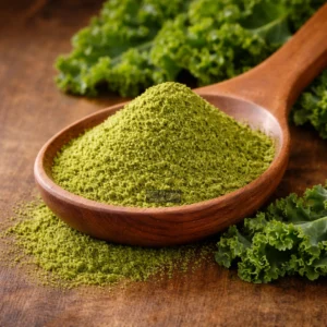 Kale extract spilling from wooden spoon