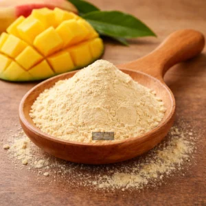 Mango powder on wooden surface