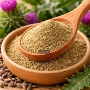 Milk thistle powder and flowers close-up