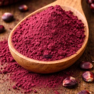 Purple corn powder in wooden spoon