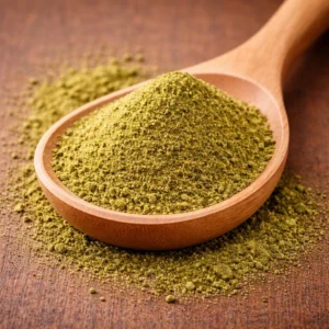 Vibrant jalapeno powder in wooden spoon