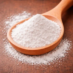 Wooden spoon filled with MCC powder