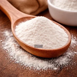 NonDairy Cream powder on Wooden spoon.webp